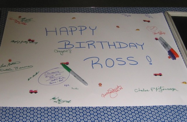 A large birthday card was signed by all in attendance