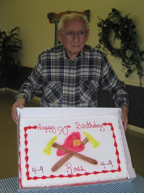 Chief Parmer with his birthday cake at a party held at Station 4-9 in 2007