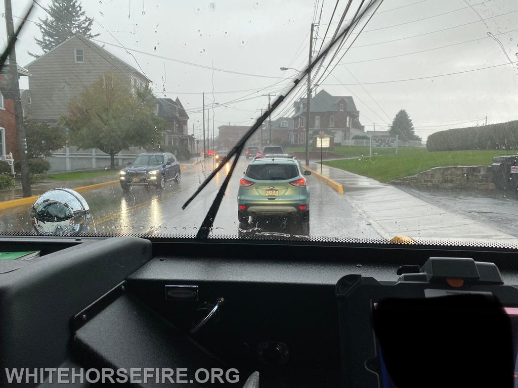 Fire engine rides were available for those that were interested. This is the view from Engine 39-2 on East Main Street in New Holland as a brief rainstorm covered the area after the end of the ceremonies. 